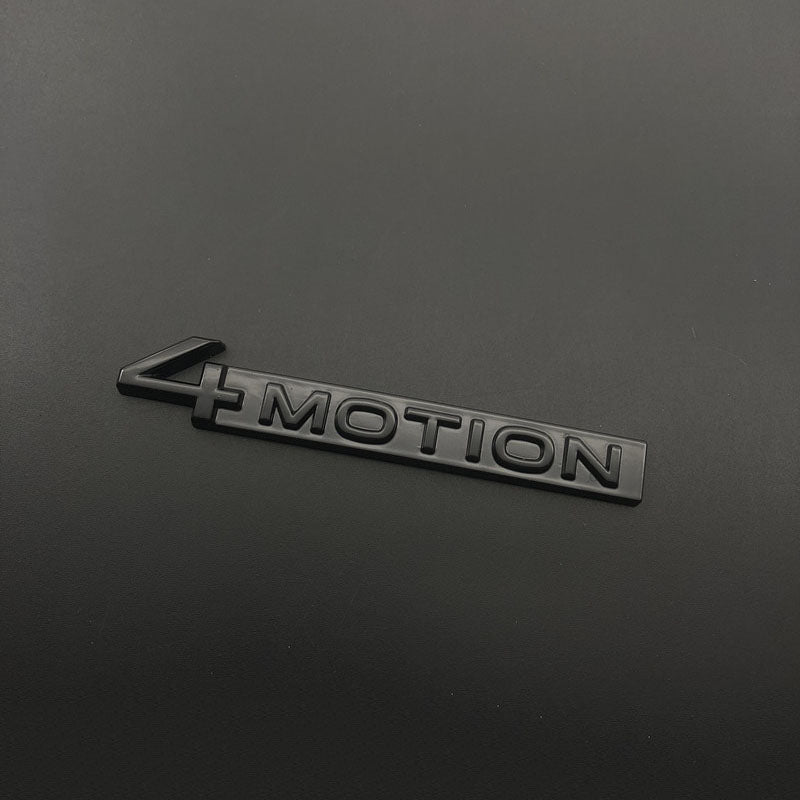 Adesivi Pinalloy ABS con emblema e scritta 4 Motion (nero)