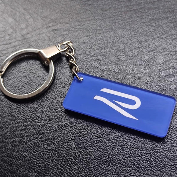 Pinalloy Blue Key Chain with "R"